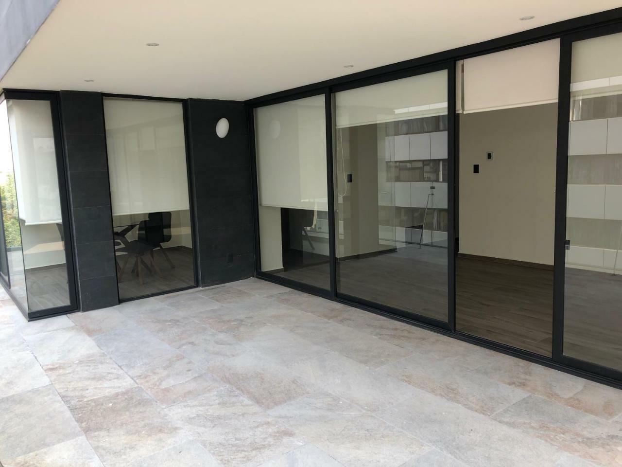 Mc Suites Cidade do México Exterior foto A glass sliding door