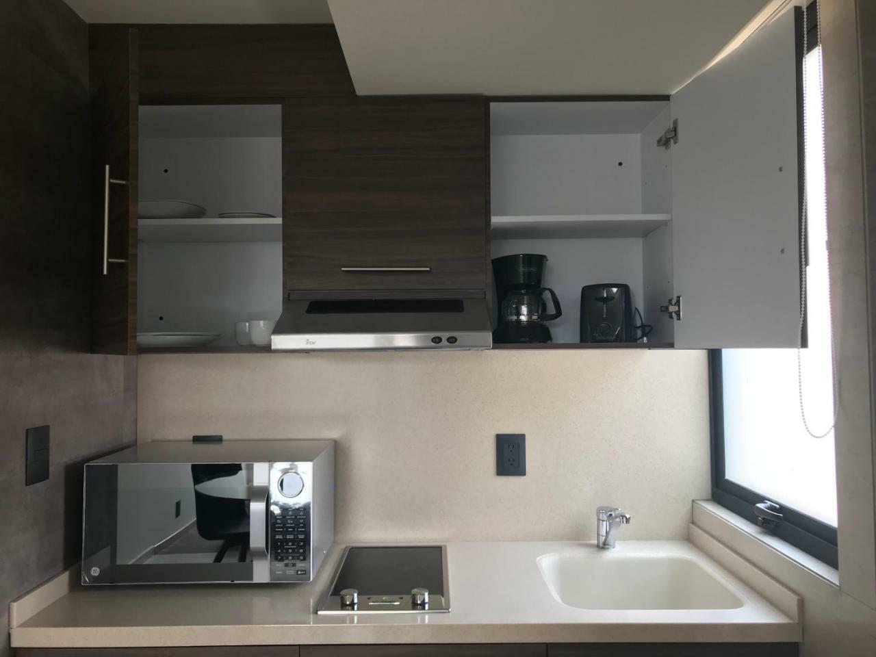Mc Suites Cidade do México Exterior foto A kitchenette in a hotel